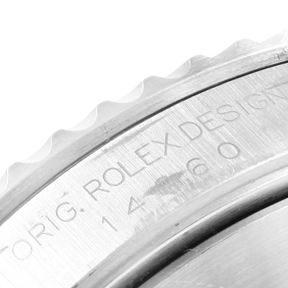 The image shows a close-up of the engraved case back of a Rolex Submariner 14060 Men's Stainless Steel Black Dial 14060 Men's Stainless Steel Black Dial watch.