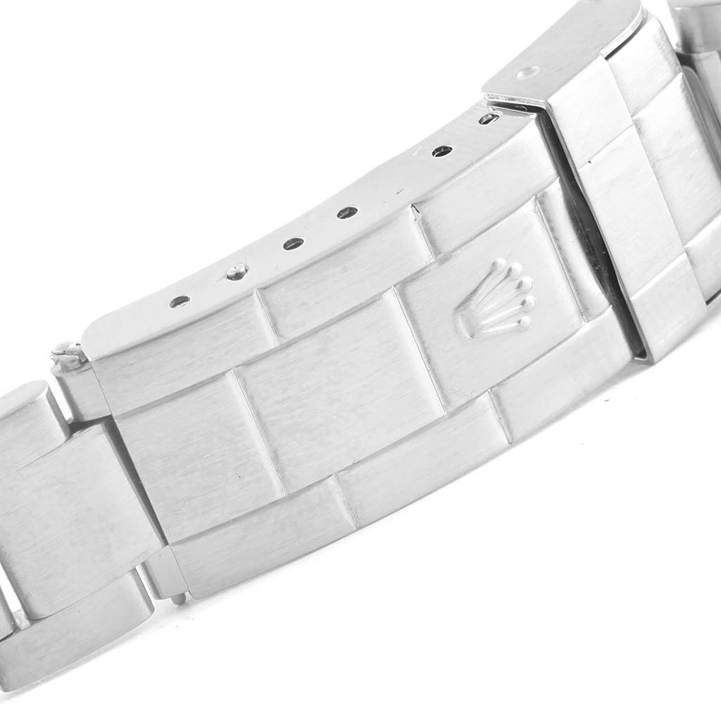 This image shows the clasp of a Rolex Submariner 14060 Men's Stainless Steel Black Dial 14060 Men's Stainless Steel Black Dial watch bracelet, featuring the Rolex logo.
