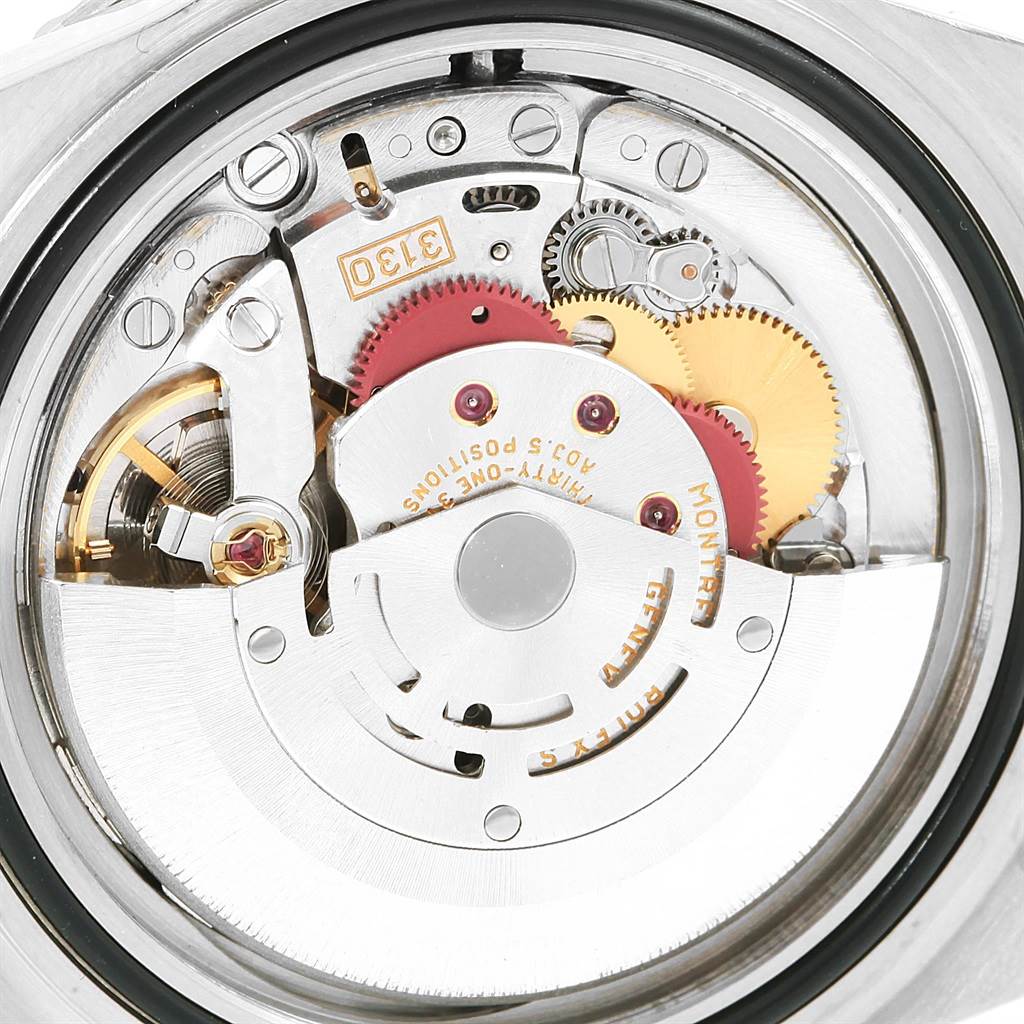 This close-up shows the intricate mechanical movement of the Rolex Submariner 14060 Men's Stainless Steel Black Dial 14060 Men's Stainless Steel Black Dial watch from a top-down angle.