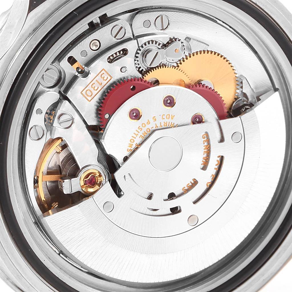 The image shows the internal mechanism and components of a Rolex Submariner 14060 Men's Stainless Steel Black Dial 14060 Men's Stainless Steel Black Dial watch from a close-up, rear angle.