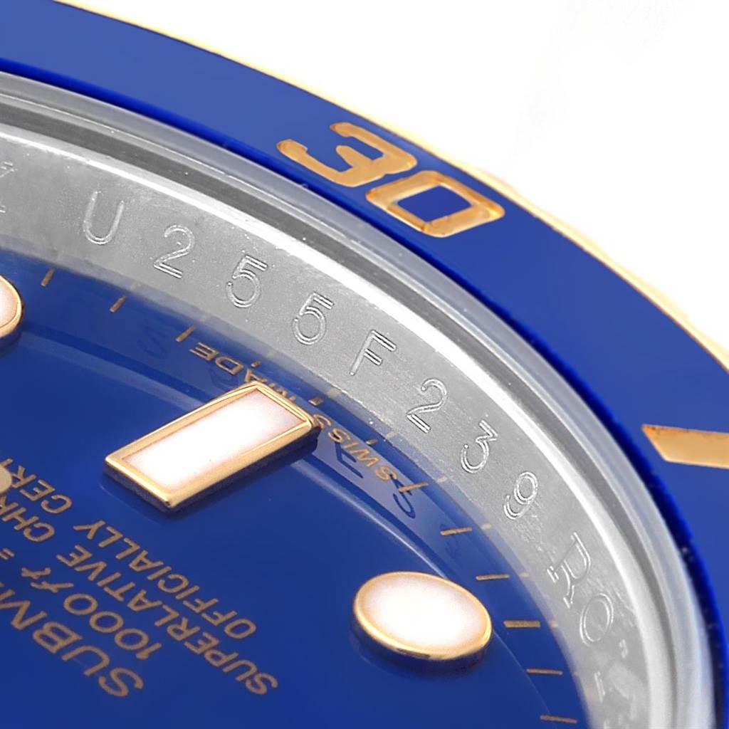This close-up angle shows the dial and bezel of a Rolex Submariner 116613 Men's Steel and Gold (two tone) Blue Dial 116613 Men's Steel and Gold (two tone) Blue Dial watch, featuring blue and gold details.