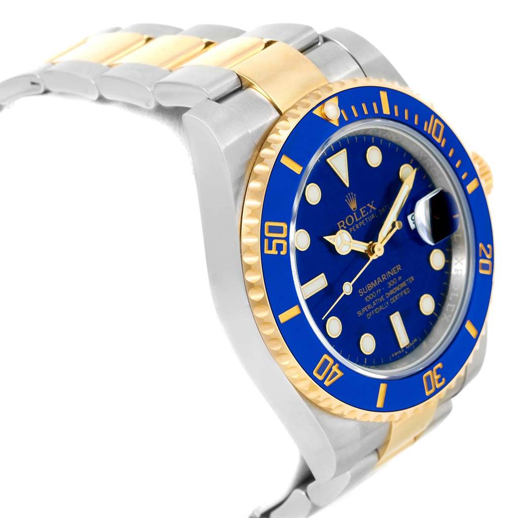 The image shows a Rolex Submariner 116613 Men's Steel and Gold (two tone) Blue Dial 116613 Men's Steel and Gold (two tone) Blue Dial watch from an angled side view, highlighting its blue bezel, dial, and two-tone bracelet.