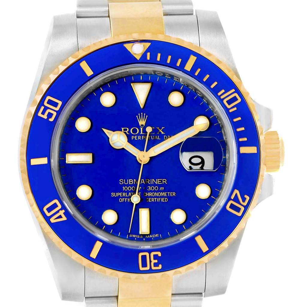 The image shows the front view of a Rolex Submariner 116613 Men's Steel and Gold (two tone) Blue Dial 116613 Men's Steel and Gold (two tone) Blue Dial watch, highlighting its blue dial, date window, and yellow-gold bezel accents.