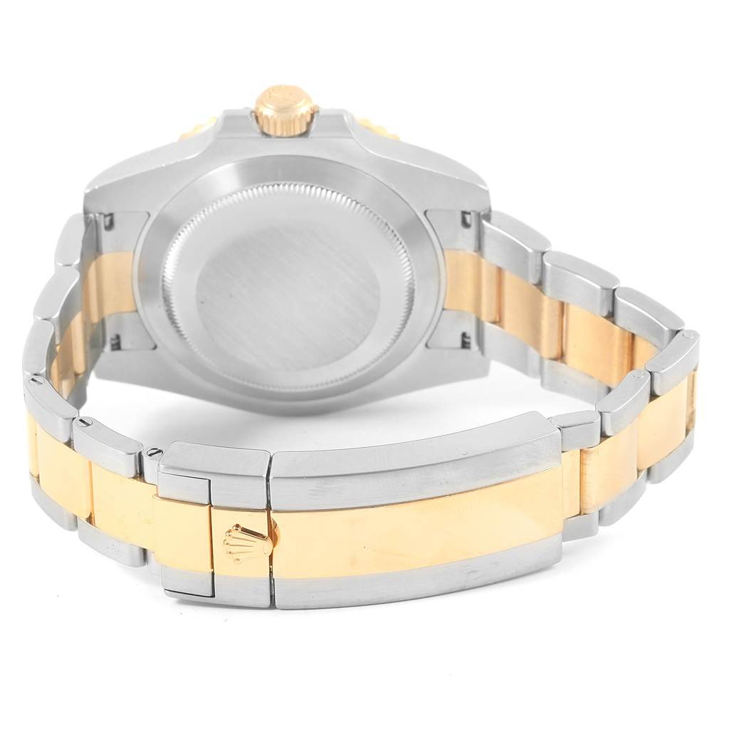 The image shows the back and bracelet of a Rolex Submariner 116613 Men's Steel and Gold (two tone) Blue Dial 116613 Men's Steel and Gold (two tone) Blue Dial watch, highlighting its two-tone design and clasp.