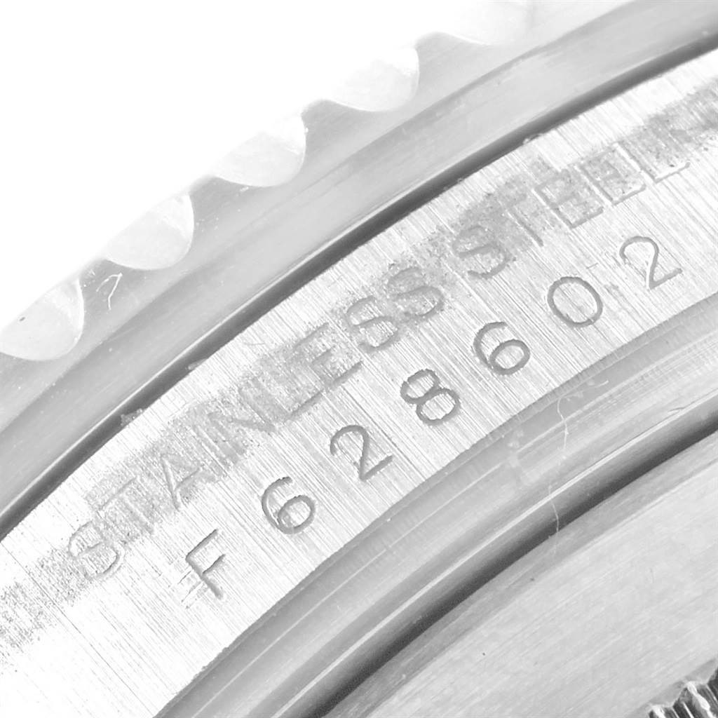 This image shows a close-up angle of the case back and serial number of the Rolex Submariner 16610 Men's Stainless Steel Black Dial 16610 Men's Stainless Steel Black Dial, highlighting its stainless steel construction.