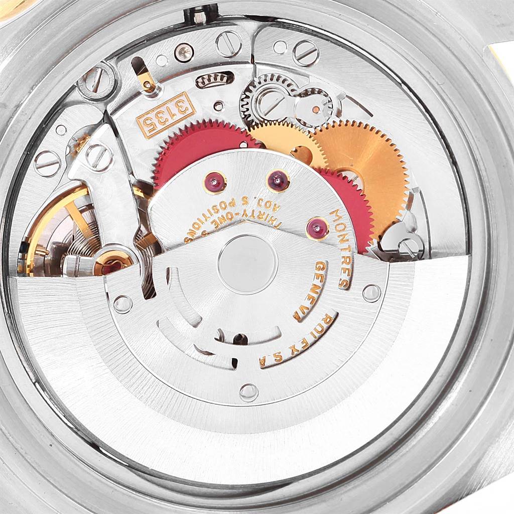 The image shows the internal movement mechanism of the Rolex Submariner 16613 Men's Steel and Gold (two tone) Black Dial 16613 Men's Steel and Gold (two tone) Black Dial watch from a close-up, top-down angle.