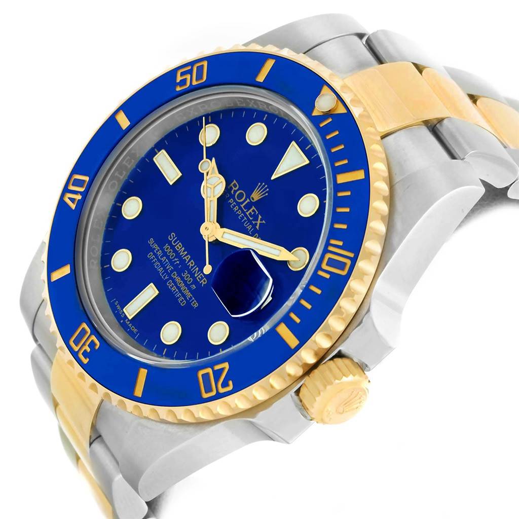 This image shows a side angle of the Rolex Submariner 116613 Men's Steel and Gold (two tone) Blue Dial 116613 Men's Steel and Gold (two tone) Blue Dial watch, highlighting the face, bezel, crown, and part of the bracelet.