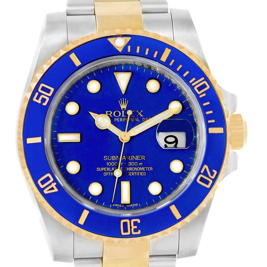 The Rolex Submariner 116613 Men's Steel and Gold (two tone) Blue Dial 116613 Men's Steel and Gold (two tone) Blue Dial watch is shown from a top-down angle, highlighting its blue dial, gold bezel, and bracelet.