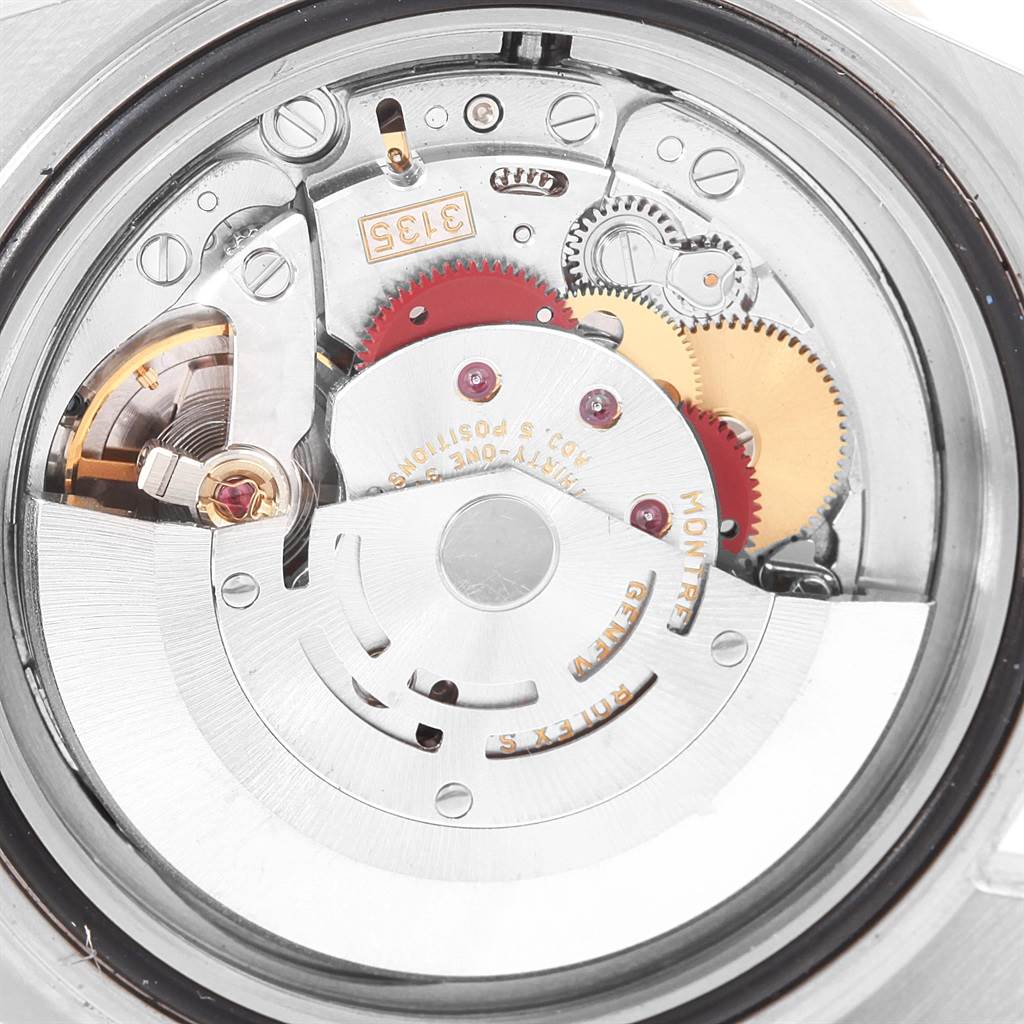 This image shows the intricate movement and internal mechanism of the Rolex Submariner 16610 Men's Stainless Steel Black Dial 16610 Men's Stainless Steel Black Dial watch from a back angle.