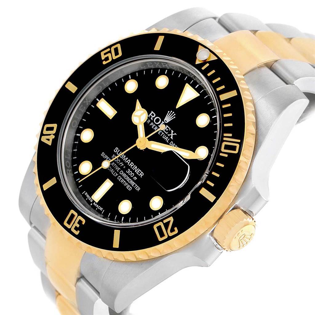 This image shows a close-up angle of the Rolex Submariner 116613 Men's Steel and Gold (two tone) Black Dial 116613 Men's Steel and Gold (two tone) Black Dial watch highlighting its bezel, dial, crown, and part of the bracelet.