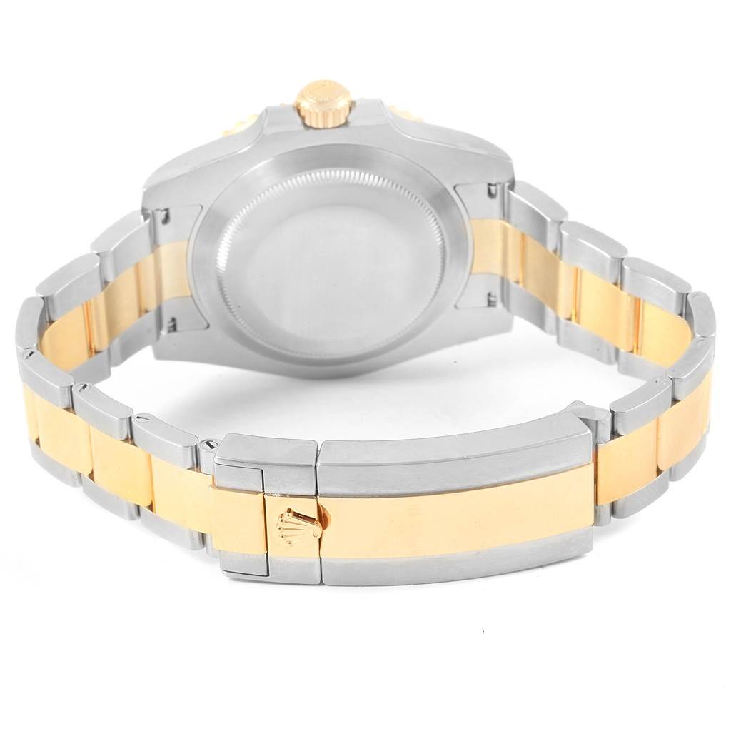 This image shows the back view of a Rolex Submariner 116613 Men's Steel and Gold (two tone) Blue Dial 116613 Men's Steel and Gold (two tone) Blue Dial model watch, focusing on the case back, two-tone bracelet, and clasp.