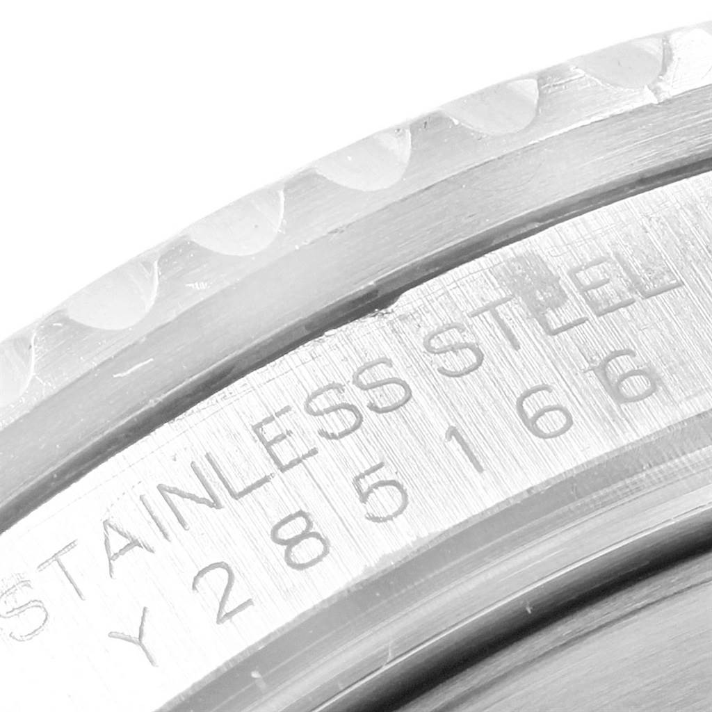 The image shows a close-up view of the stainless steel case back edge of a Rolex Submariner 16610 Men's Stainless Steel Black Dial 16610 Men's Stainless Steel Black Dial model watch.