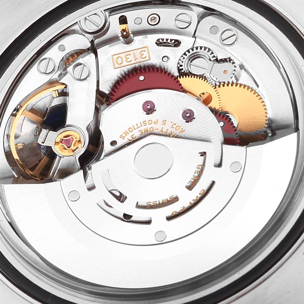 The image shows the intricate internal mechanism of a Rolex Submariner 114060 Men's Stainless Steel Black Dial 114060 Men's Stainless Steel Black Dial watch from a close-up angle.