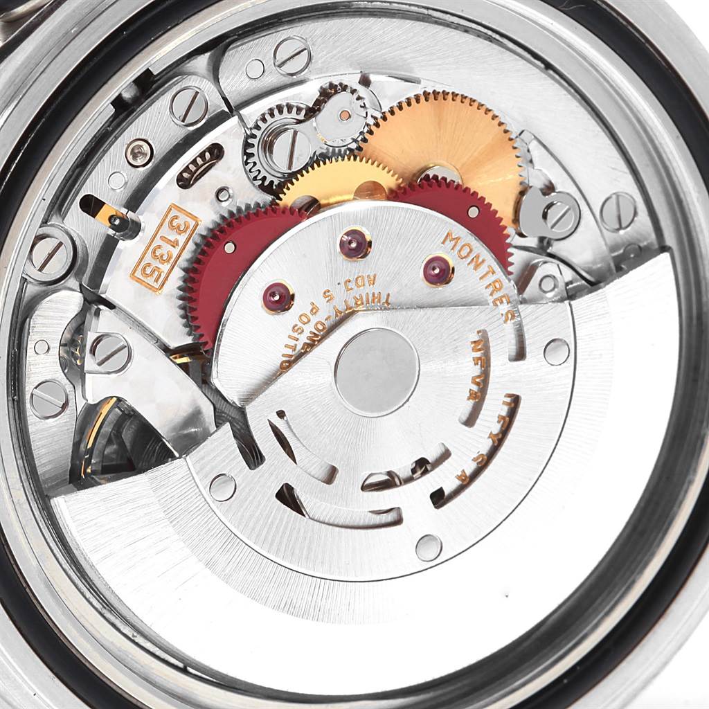 This image shows the internal movement mechanics of a Rolex Submariner 16610 Men
s Stainless Steel Black Dial 16610 Men
s Stainless Steel Black Dial watch from a close-up, top-down angle.