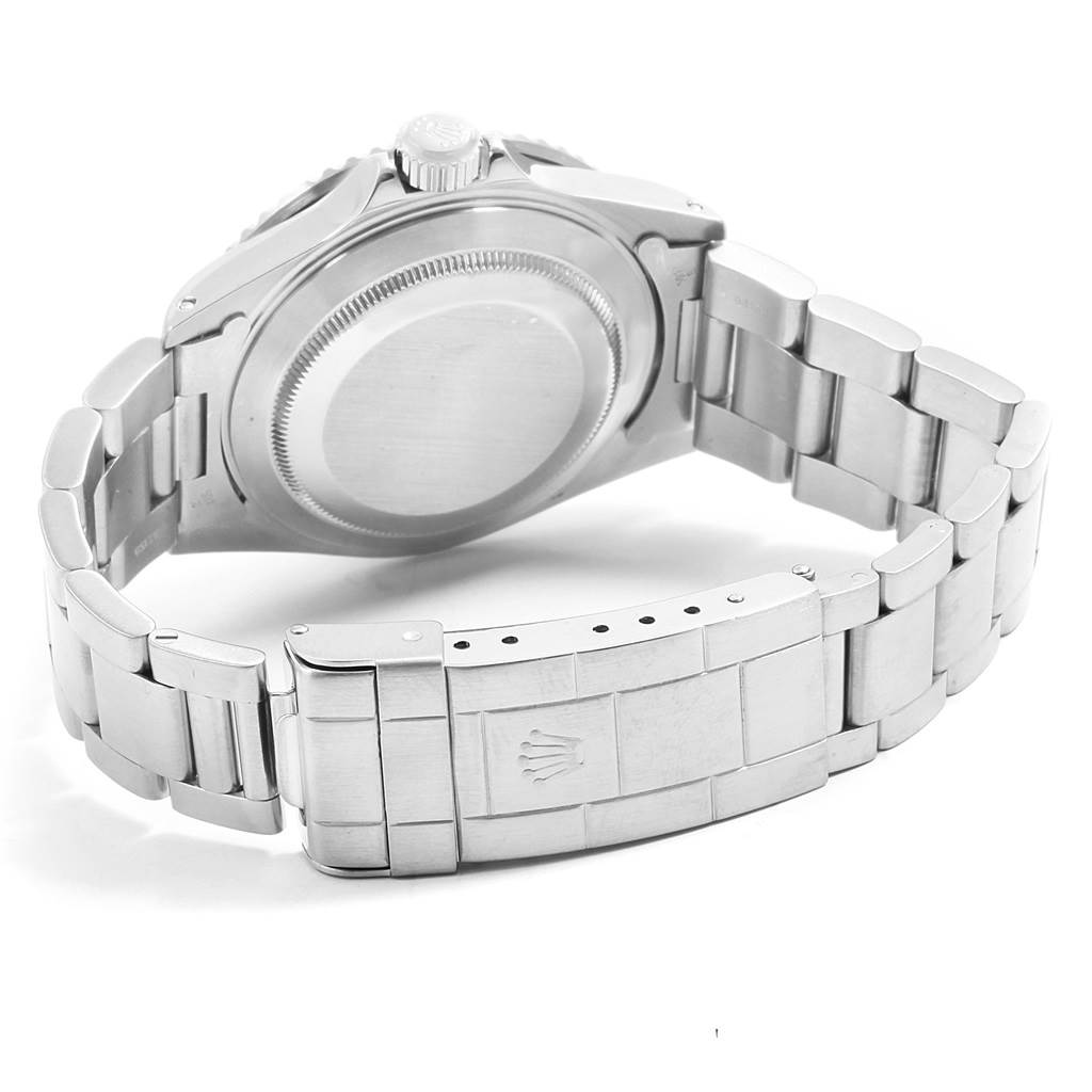 The image shows the back case and bracelet of the Rolex Submariner 16610 Men
s Stainless Steel Black Dial 16610 Men
s Stainless Steel Black Dial watch at an angle.