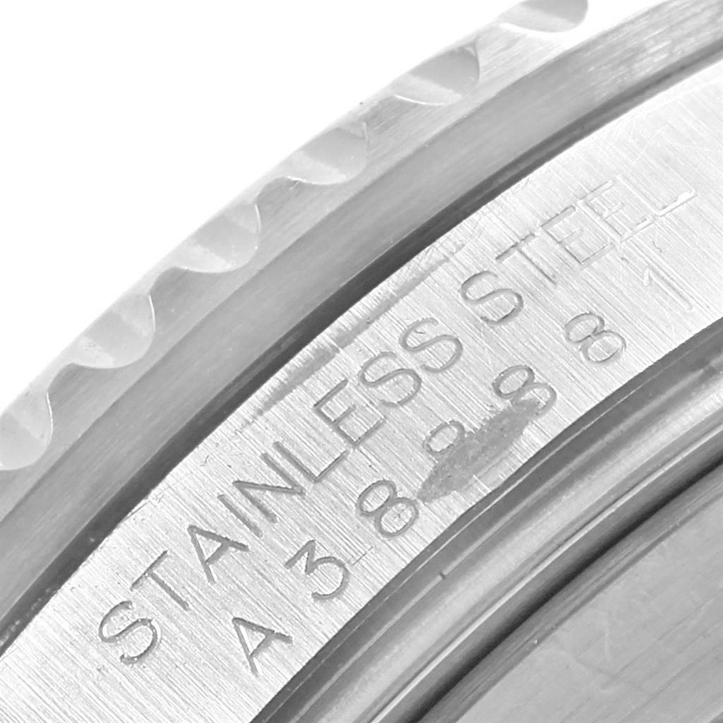 This image shows a close-up of the side engraving on the stainless steel case of a Rolex Submariner 16610 Men
s Stainless Steel Black Dial 16610 Men
s Stainless Steel Black Dial watch.
