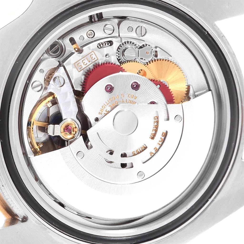 The image shows the internal movement mechanism of a Rolex Submariner 116613 Men's Steel and Gold (two tone) Blue Dial 116613 Men's Steel and Gold (two tone) Blue Dial watch, viewed from the back.