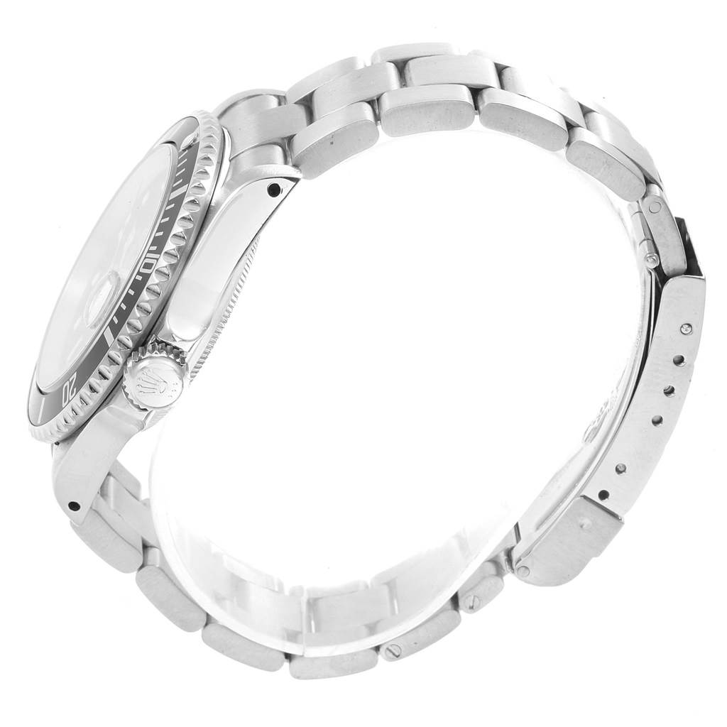 This image shows a side view of the Rolex Submariner 16610 Men
s Stainless Steel Black Dial 16610 Men
s Stainless Steel Black Dial watch, focusing on its case, bracelet, and clasp.