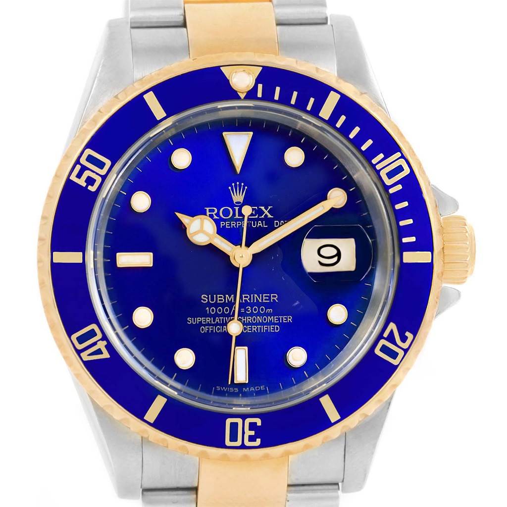 The image shows a front view of a Rolex Submariner 16613 Men
s Steel and Gold (two tone) Blue Dial 16613 Men
s Steel and Gold (two tone) Blue Dial watch, highlighting its blue dial, bezel, and two-tone bracelet.
