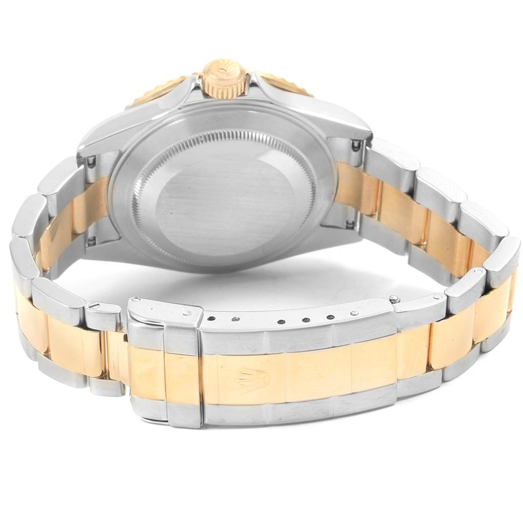 The image shows the back and bracelet of a Rolex Submariner 16613 Men
s Steel and Gold (two tone) Blue Dial 16613 Men
s Steel and Gold (two tone) Blue Dial watch at a rear angle.