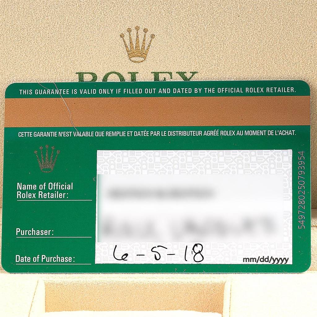 The image shows a guarantee card for the Rolex Submariner 114060 Men
s Stainless Steel Black Dial 114060 Men
s Stainless Steel Black Dial watch, including retailer and purchase date information.