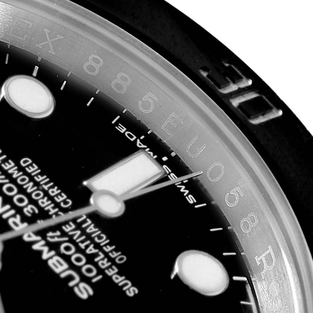 This close-up angle shows the dial, hour markers, and part of the bezel of the Rolex Submariner 114060 Men
s Stainless Steel Black Dial 114060 Men
s Stainless Steel Black Dial watch.