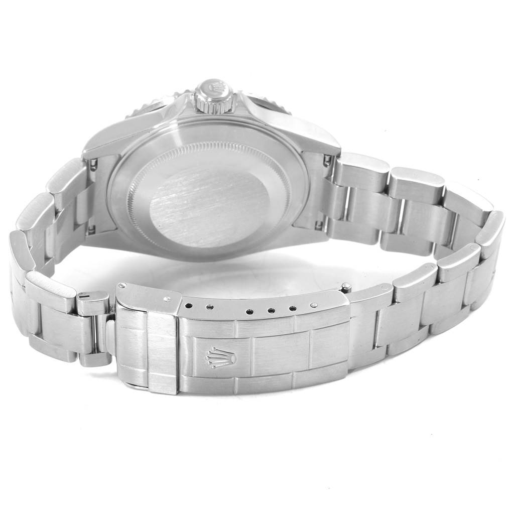 The image shows the backside and bracelet of the Rolex Submariner 16610 Men
s Stainless Steel Black Dial 16610 Men
s Stainless Steel Black Dial watch, highlighting the clasp and case back.