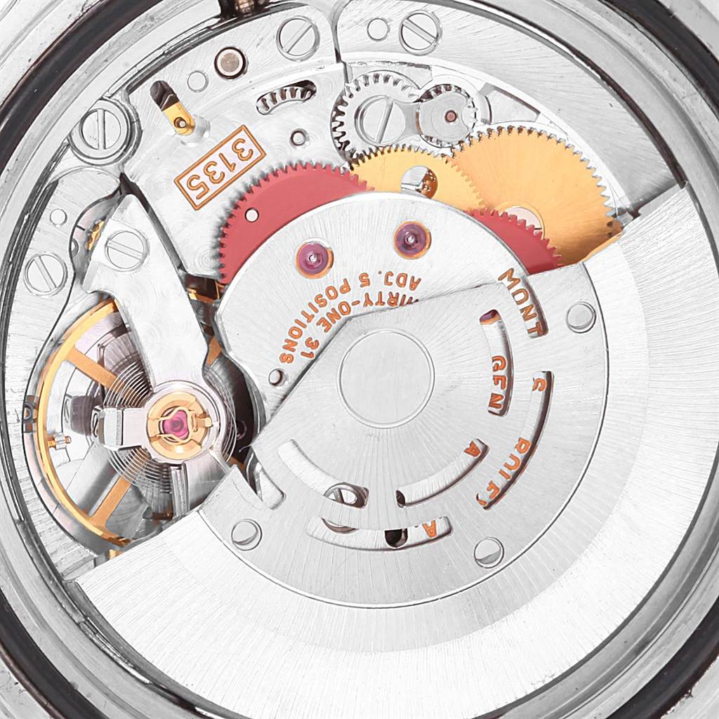 This image shows the intricate internal movement and gears of the Rolex Submariner 16613 Men
s Steel and Gold (two tone) Grey Dial 16613 Men
s Steel and Gold (two tone) Grey Dial watch model.