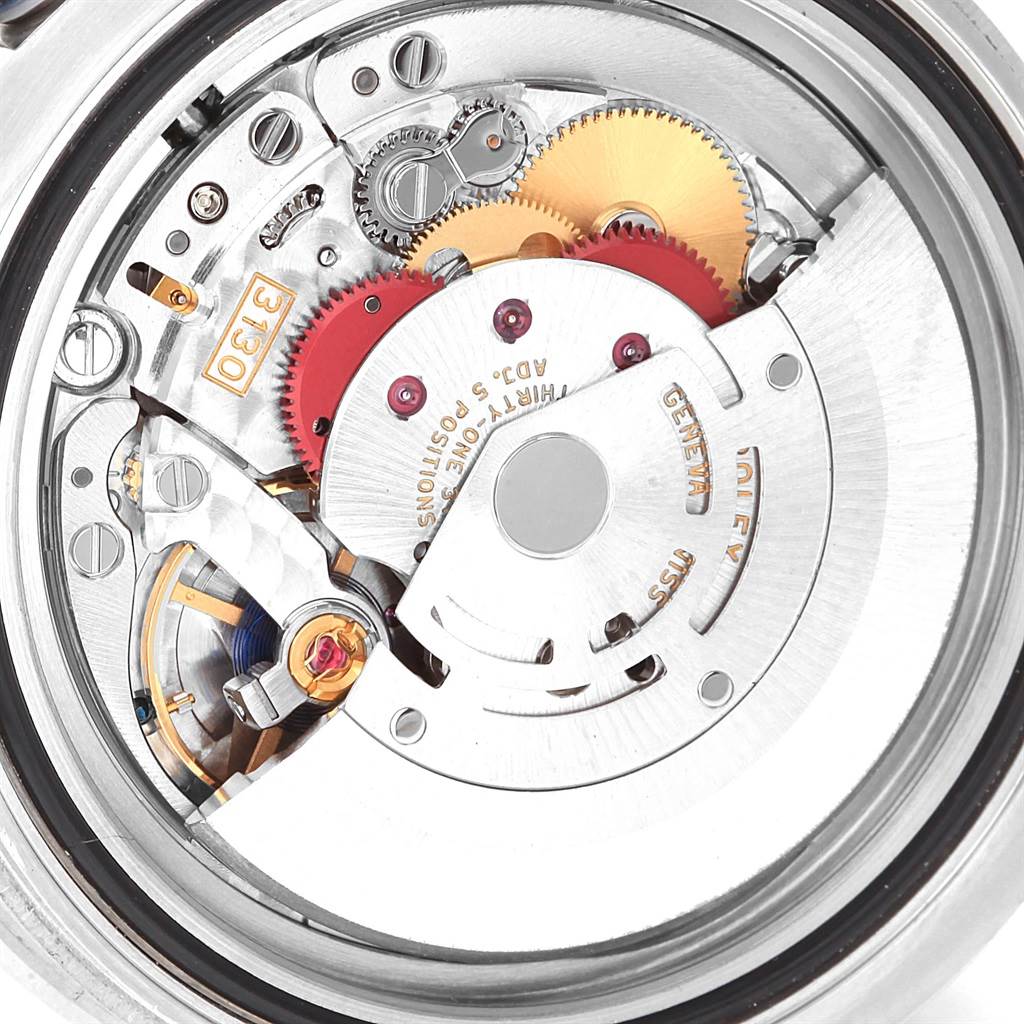 The image shows the internal mechanical movement of a Rolex Submariner 114060 Men
s Stainless Steel Black Dial 114060 Men
s Stainless Steel Black Dial watch from a top-down angle.