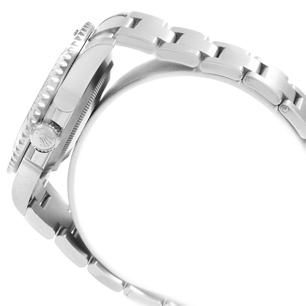 This image shows a side view of the Rolex Submariner 114060 Men
s Stainless Steel Black Dial 114060 Men
s Stainless Steel Black Dial watch
s case, bezel, crown, and part of the bracelet.