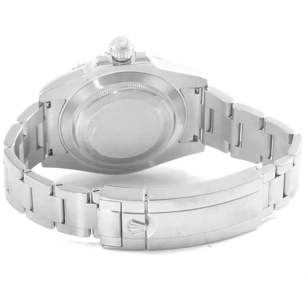 The image shows the backside of a Rolex Submariner 114060 Men
s Stainless Steel Black Dial 114060 Men
s Stainless Steel Black Dial watch, highlighting the case back, crown, and bracelet with the clasp.