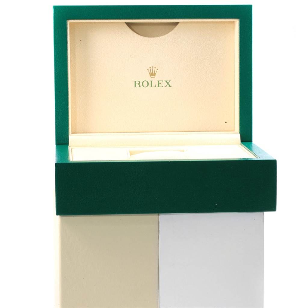 The image shows an open box for a Rolex Submariner 114060 Men
s Stainless Steel Black Dial 114060 Men
s Stainless Steel Black Dial, featuring the logo inside the lid.