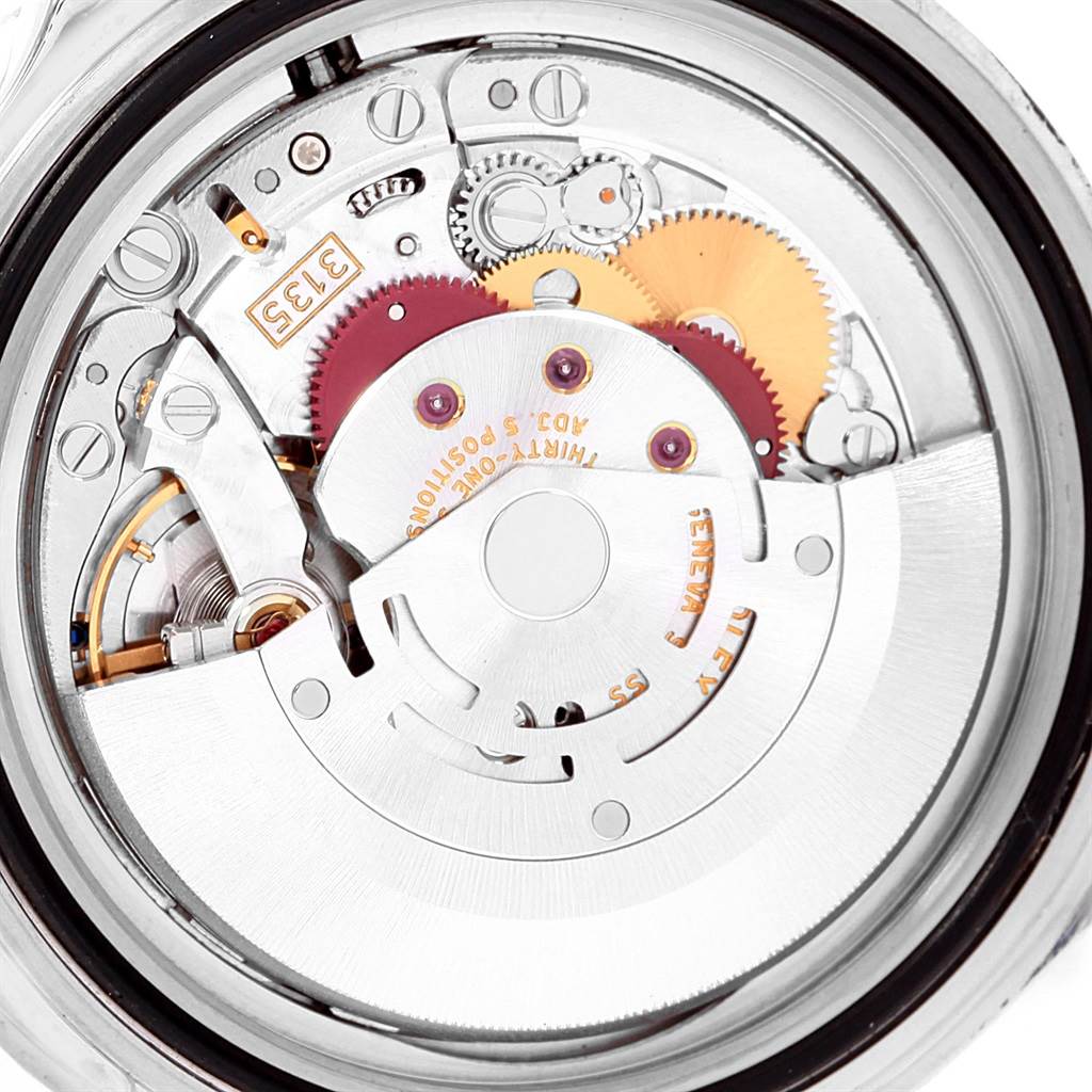 The image shows a close-up of the movement mechanism inside a Rolex Submariner 16610 Men
s Stainless Steel Black Dial 16610 Men
s Stainless Steel Black Dial watch viewed from the back.