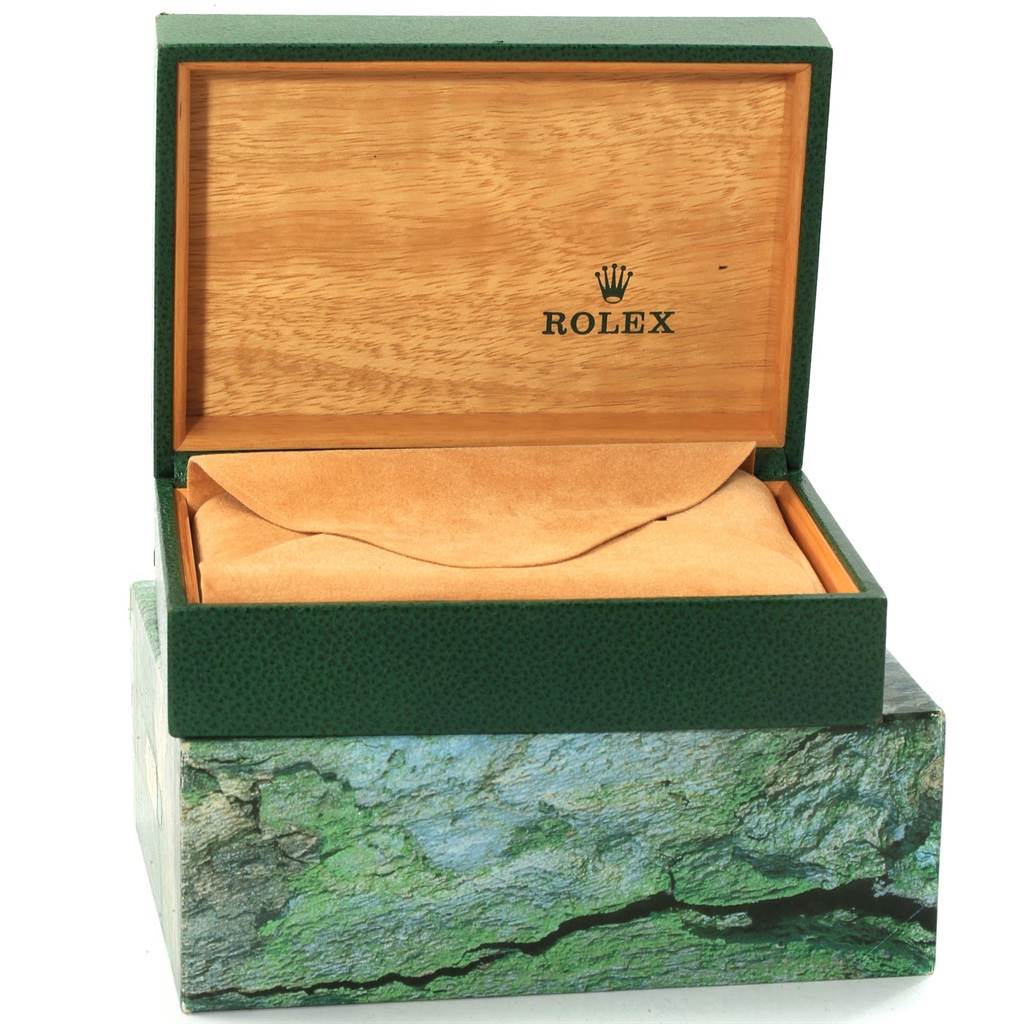 The image shows a Rolex Submariner 16613 Men's Steel and Gold (two tone) Blue Dial 16613 Men's Steel and Gold (two tone) Blue Dial watch box with the lid open, revealing the interior packaging.