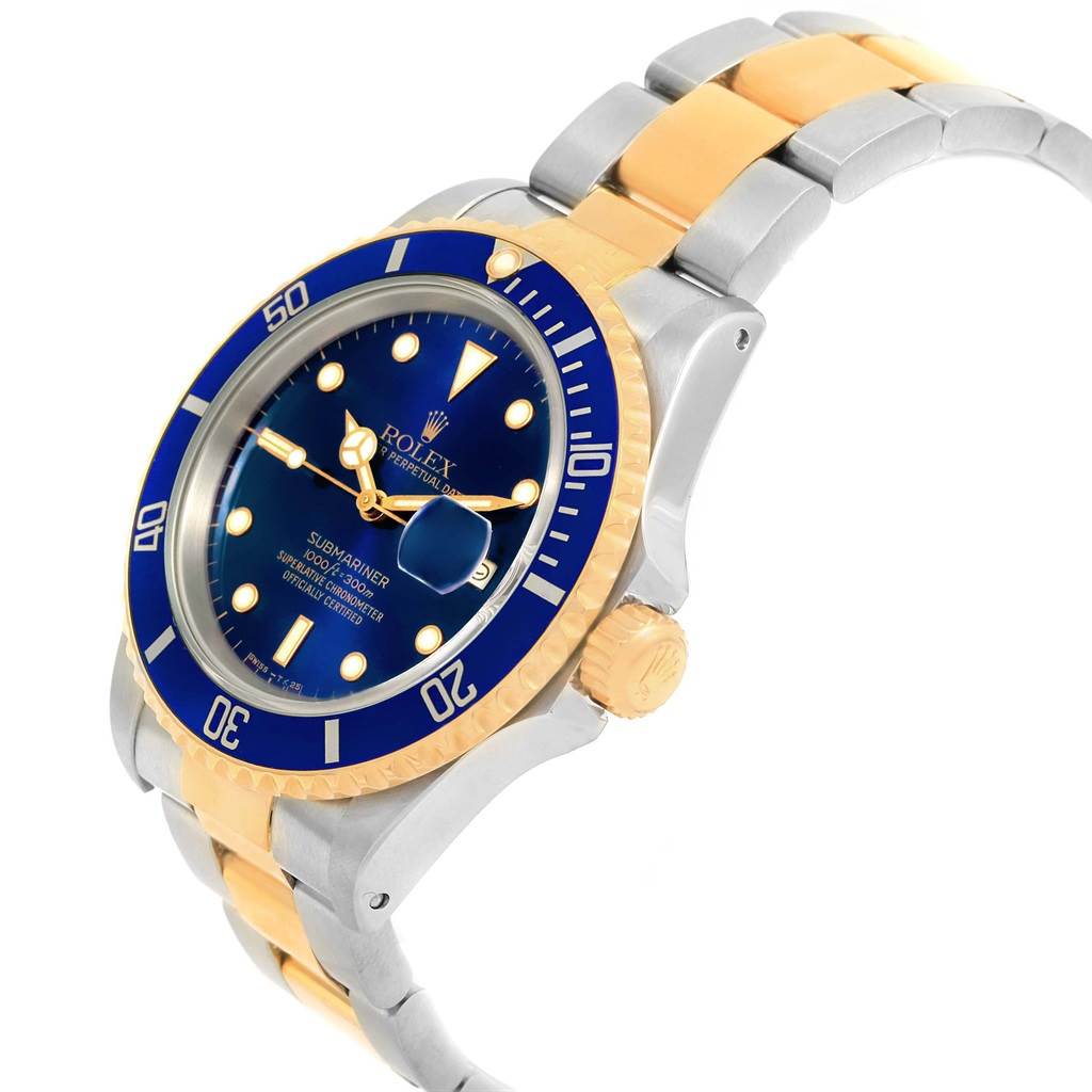 The image shows a side and partial front view of a Rolex Submariner 16613 Men's Steel and Gold (two tone) Blue Dial 16613 Men's Steel and Gold (two tone) Blue Dial, highlighting the blue dial, bezel, and two-tone bracelet.
