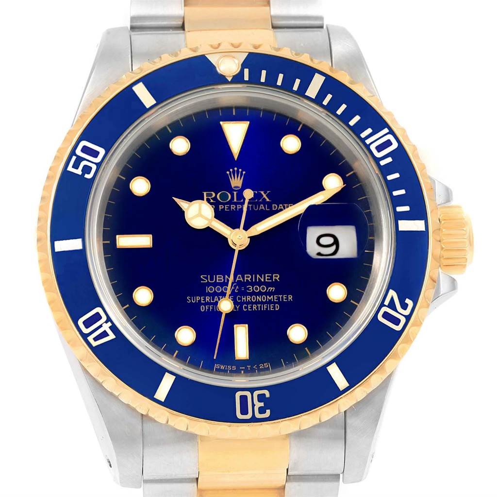 This image shows a front view of the Rolex Submariner 16613 Men's Steel and Gold (two tone) Blue Dial 16613 Men's Steel and Gold (two tone) Blue Dial watch, highlighting the blue dial, date window, and gold and silver bracelet.