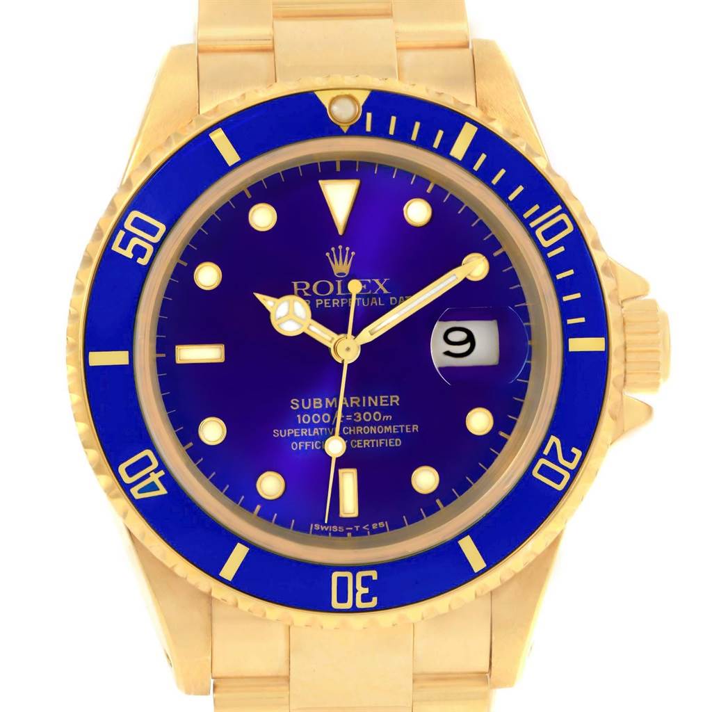 This image shows a front view of the Rolex Submariner 16618 Men's Yellow Gold Purple Dial 16618 Men's Yellow Gold Purple Dial watch, highlighting its blue dial, date window, and gold bracelet.