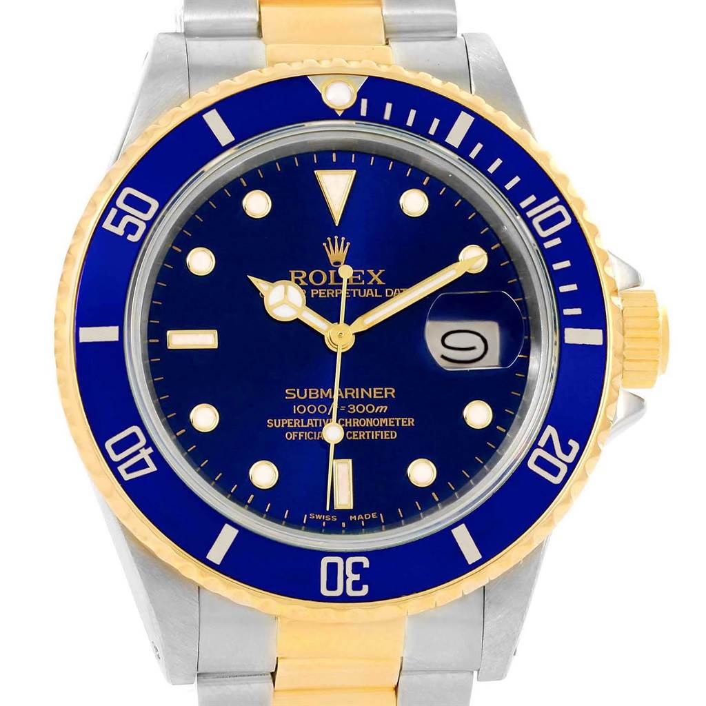 The image shows a frontal view of a Rolex Submariner 16803 Men's Steel and Gold (two tone) Blue Dial 16803 Men's Steel and Gold (two tone) Blue Dial watch, featuring a blue dial, a gold bezel, and a two-tone metal bracelet.