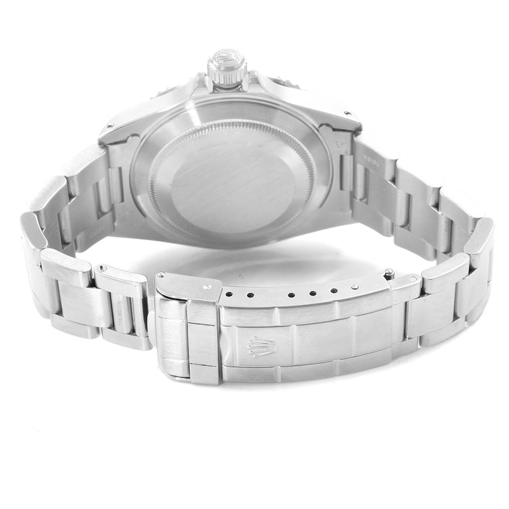 The image shows the back case and bracelet clasp of a Rolex Submariner 14060 Men
s Stainless Steel Black Dial 14060 Men
s Stainless Steel Black Dial watch.