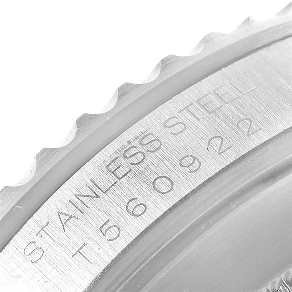 The image shows a close-up view of the bezel and engravings on a stainless steel Rolex Submariner 14060 Men
s Stainless Steel Black Dial 14060 Men
s Stainless Steel Black Dial.