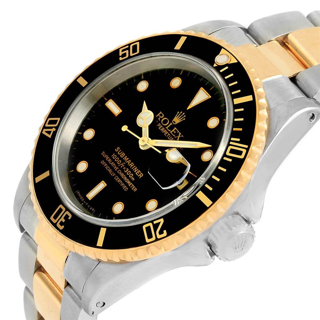 The image shows a close-up, angled view of a Rolex Submariner 16613 Men's Steel and Gold (two tone) Black Dial 16613 Men's Steel and Gold (two tone) Black Dial watch, highlighting the bezel, dial, crown, and part of the bracelet.