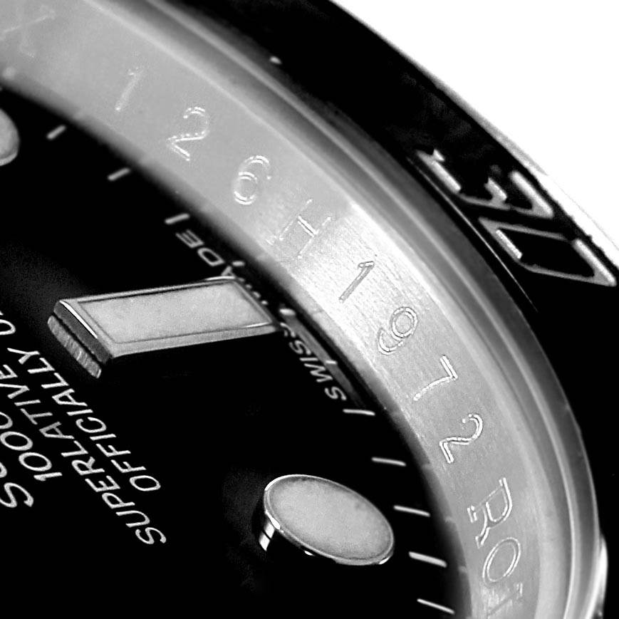 This image shows a close-up of the dial and the inner bezel of a Rolex Submariner 116610 Men
s Stainless Steel Black Dial 116610 Men
s Stainless Steel Black Dial watch.