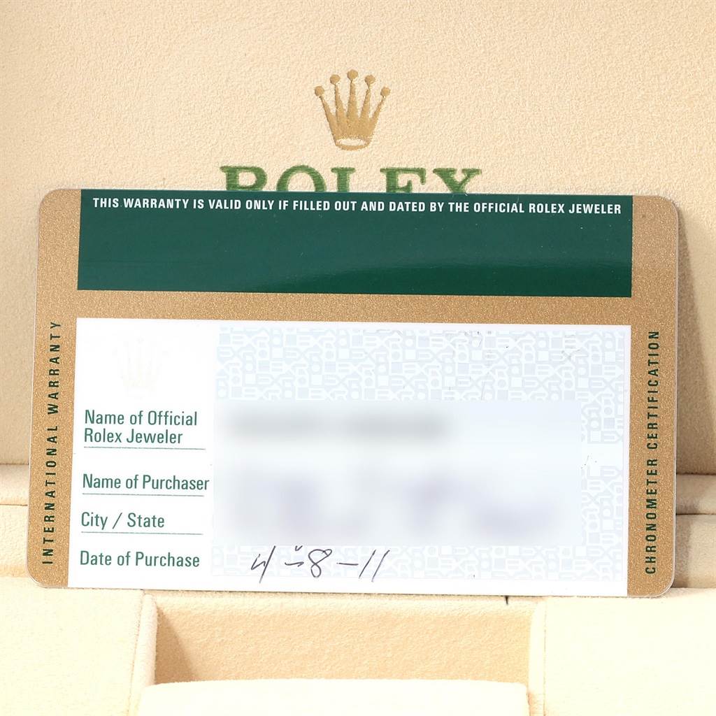 The image shows a warranty card for the Rolex Submariner 116610 Men
s Stainless Steel Black Dial 116610 Men
s Stainless Steel Black Dial with the brand logo in the background.