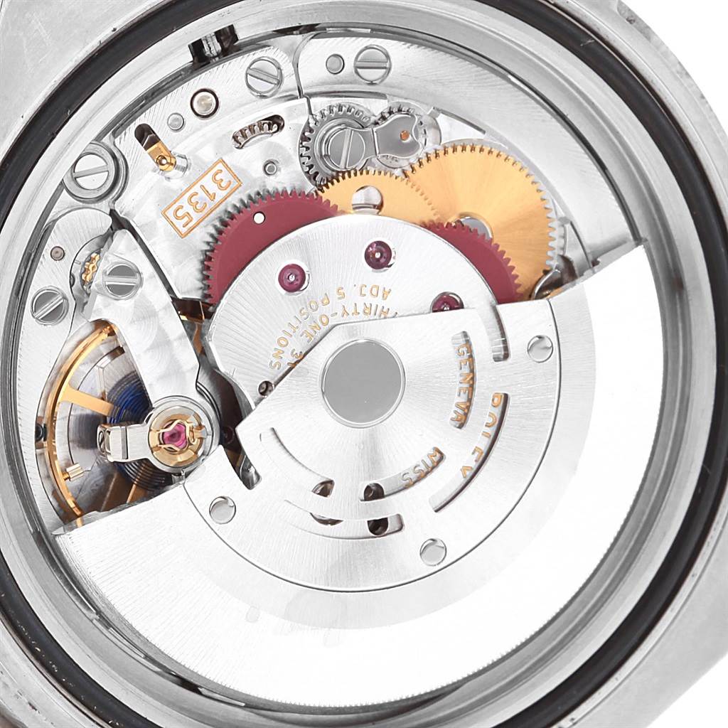 This image shows the internal mechanical movement of a Rolex Submariner 116610 Men
s Stainless Steel Black Dial 116610 Men
s Stainless Steel Black Dial watch, highlighting its intricate gears and components.