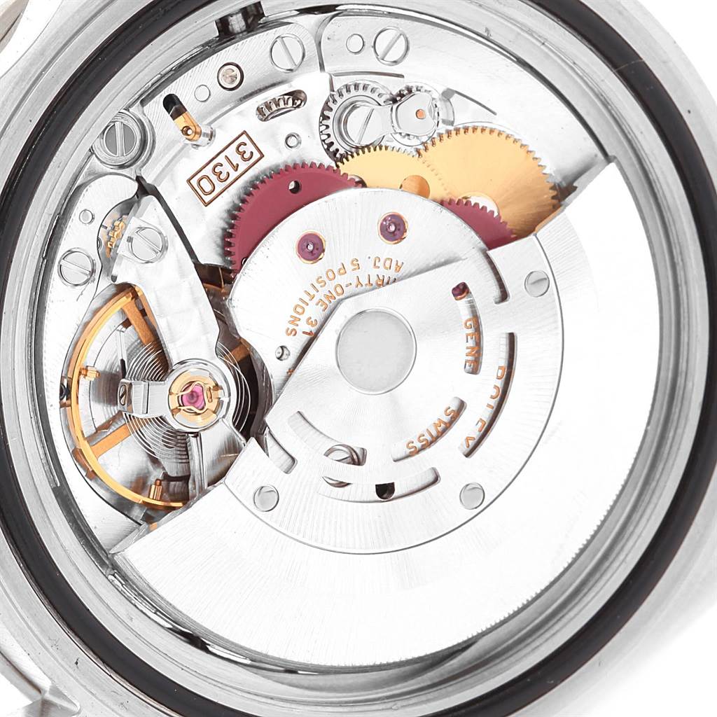 This image shows the internal mechanical movement and components of a Rolex Submariner 14060 Men
s Stainless Steel Black Dial 14060 Men
s Stainless Steel Black Dial watch from a top-down view.