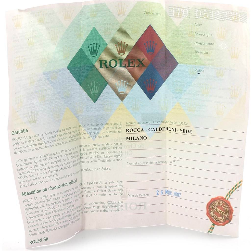 This image shows the warranty and authenticity paperwork for a Rolex Submariner 16613 Men's Steel and Gold (two tone) Black Dial 16613 Men's Steel and Gold (two tone) Black Dial watch, including dealer information and purchase date.