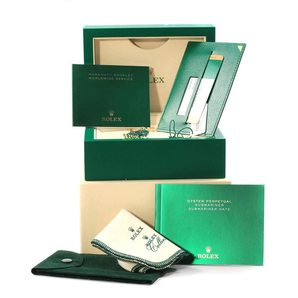 The image shows accessories for the Rolex Submariner 116610 Men
s Stainless Steel Black Dial 116610 Men
s Stainless Steel Black Dial model, including a warranty booklet, cleaning cloth, case, and various manuals.