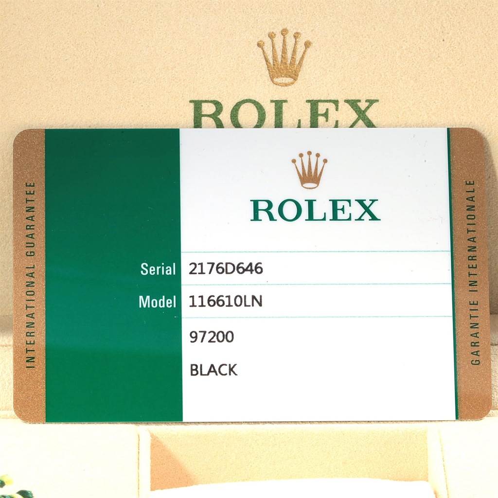 The image shows a Rolex warranty card for the Submariner model, including the serial number, model number 116610LN, and additional details.