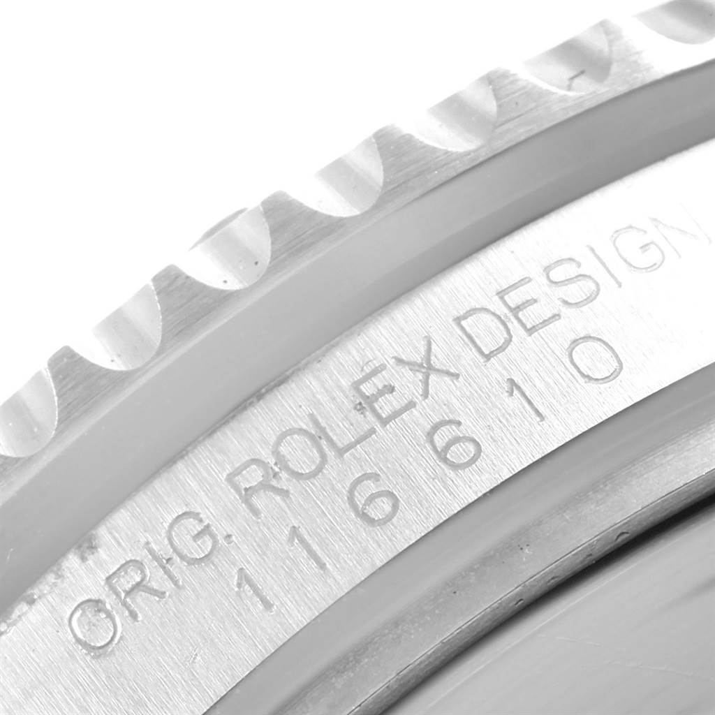 This close-up image captures the bezel and engraved casing of the Rolex Submariner 116610 Men
s Stainless Steel Black Dial 116610 Men
s Stainless Steel Black Dial watch.