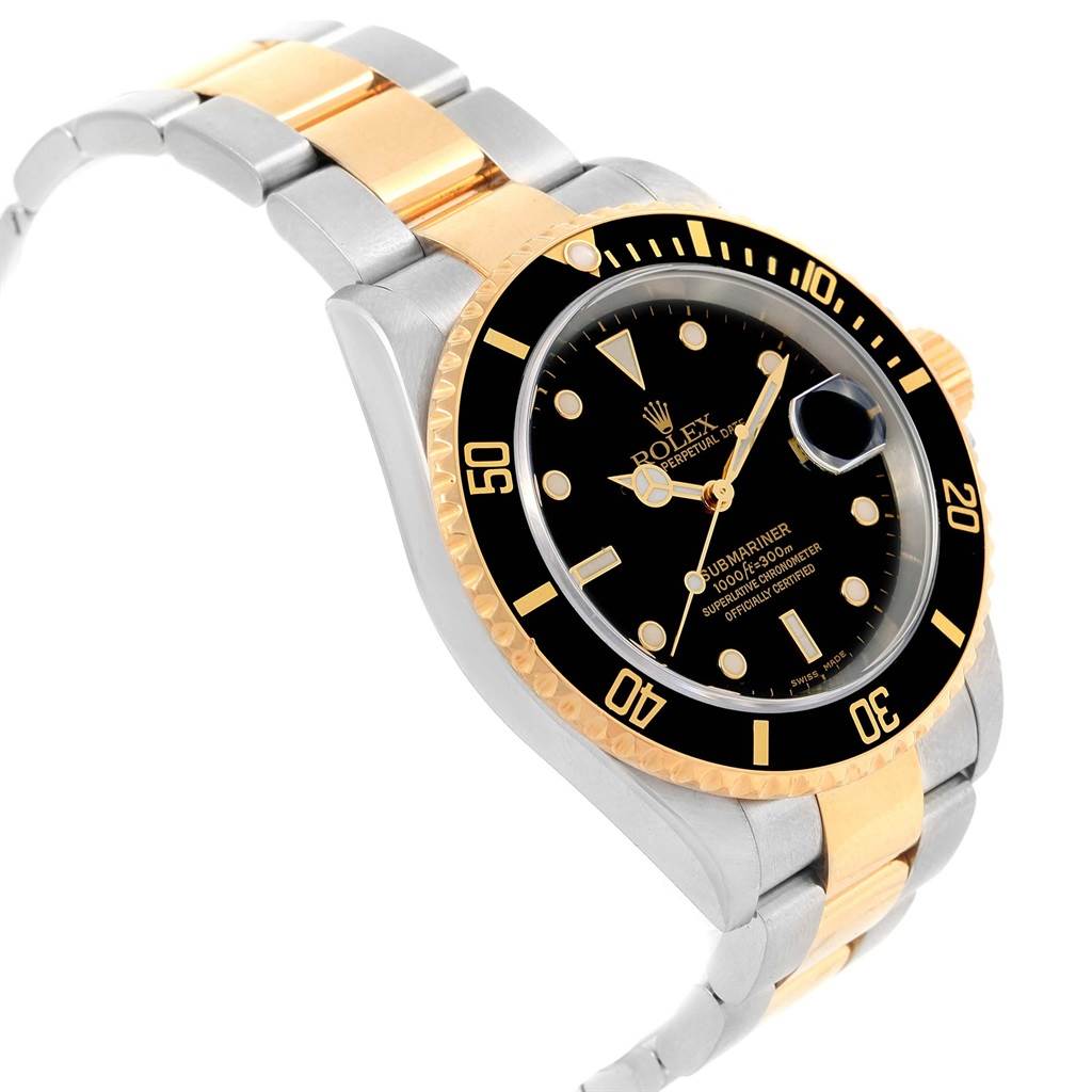 This image shows a side angle of the Rolex Submariner 16613 Men's Steel and Gold (two tone) Black Dial 16613 Men's Steel and Gold (two tone) Black Dial watch, highlighting its bezel, dial, and two-tone bracelet.